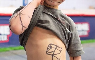 Child drawing on himself